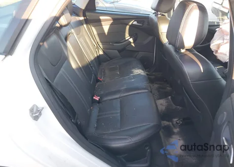 2014 Ford Focus Titanium from USA, damaged, VIN 1FADP3J27EL221699